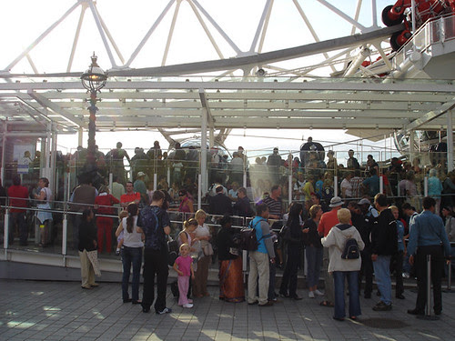 Queue at the London Eye by by cuttlefish on Flickr.  Used through Creative Commons.