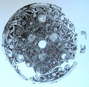 Donore disc discs with spiral motifs, engraved disc from Donore, Meath country