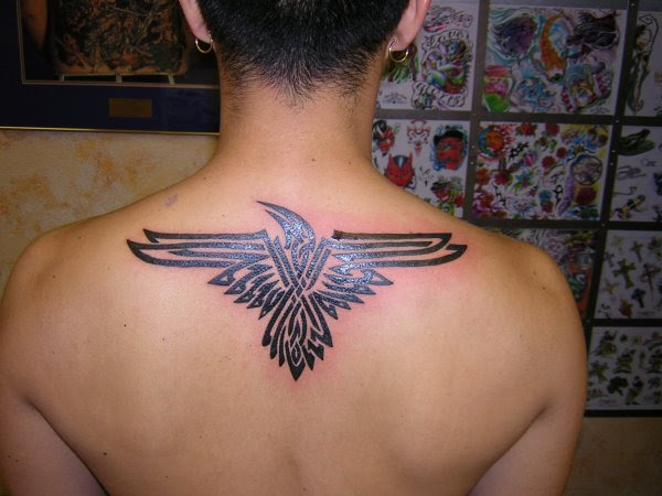 He has multiple spell runes tattooed to his body.