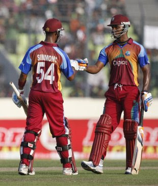 Marlon Samuels congratulates Lendl Simmons, Bangladesh v West Indies, 1st ODI, Mirpur, October 13, 2011