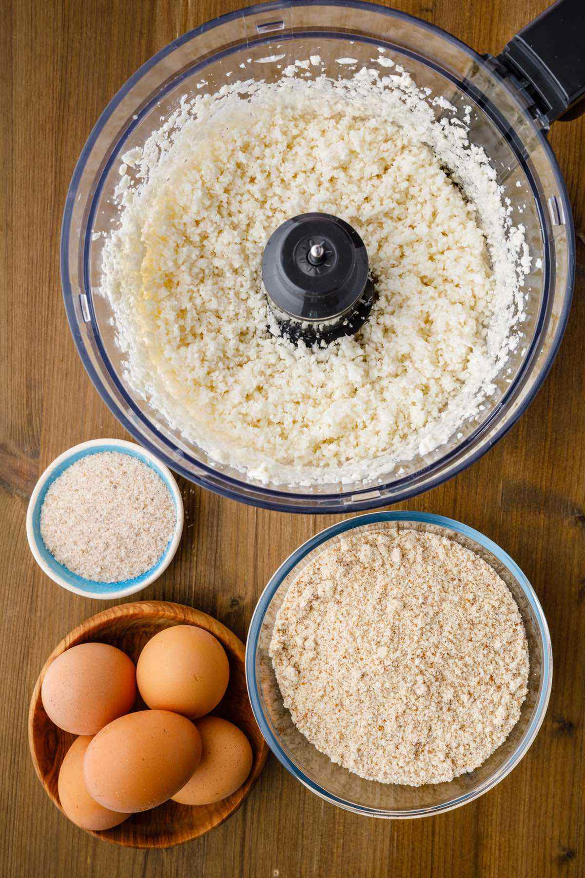 prepping cauliflower bread ingredients