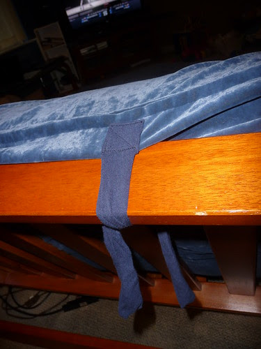 Tie around top of futon bas