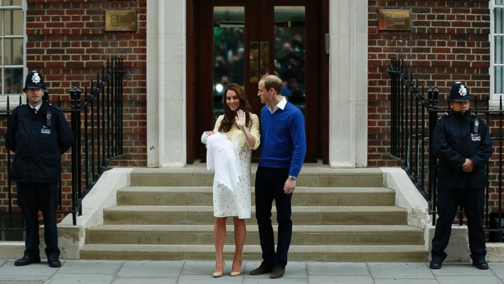 PHOTO: Britains Prince William, center right, and Kate, Duchess of Cambridge, center left, pose for the media with their newborn daughter outside St. Marys Hospitals exclusive Lindo Wing, London, Saturday, May 2, 2015.