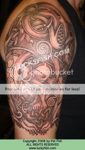 stricking tribal lower back tattoo design. Celtic Custom half sleeve: