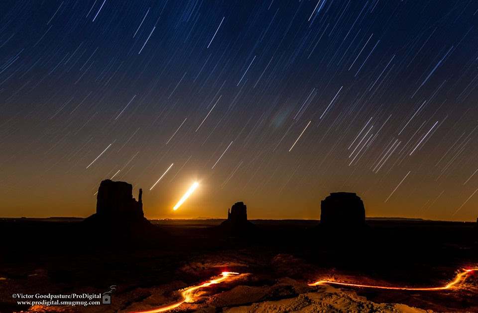 View larger. | Star trails over Monument Valley on September 27, 2013 from Victor Goodpasture. The bright object is the moon. Thank you, Victor!