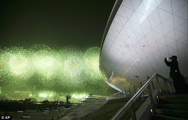 Fireworks are launched during the opening. The Shanghai Expo, the first held in a developing country, is a source of pride for many city residents, though they already are complaining about crowds, traffic jams and other disruptions