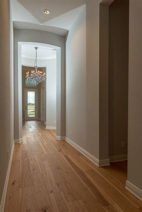 You can also use a chemical to etch the existing finish, then apply new finish. Wire-Brushed Natural Hickory - Ability Wood Flooring