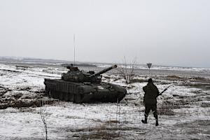 Pro-Russian separatist soldiers stand guard at a checkpoint&nbsp;&hellip;