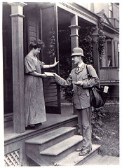 Letter Carrier Delivering Mail