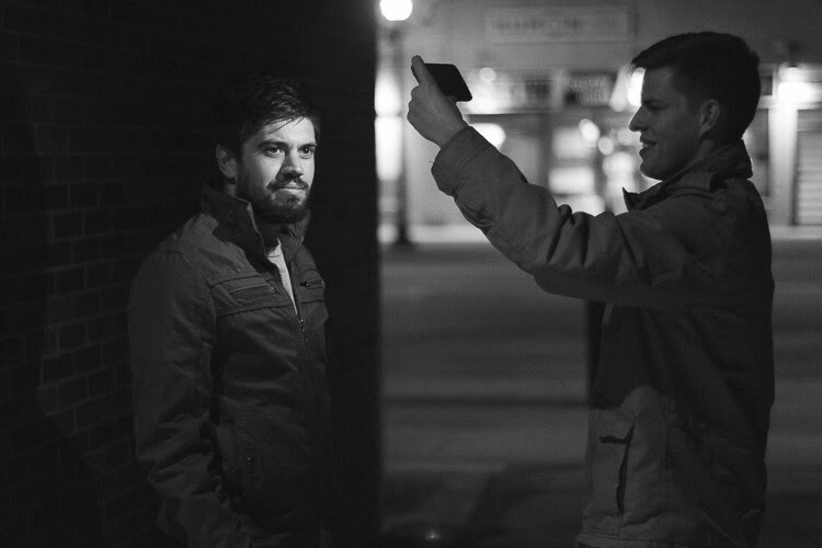 Behind the scenes of lighting a model with light from a cell phone flashlight