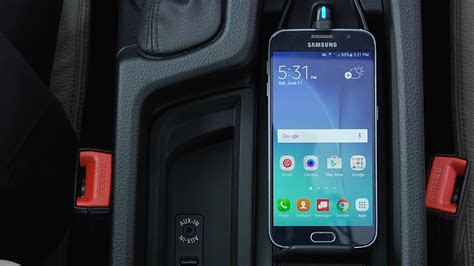 Most mobile phone cases can be wirelessly charged . Wireless Charging Tray | BMW Genius How-To - YouTube