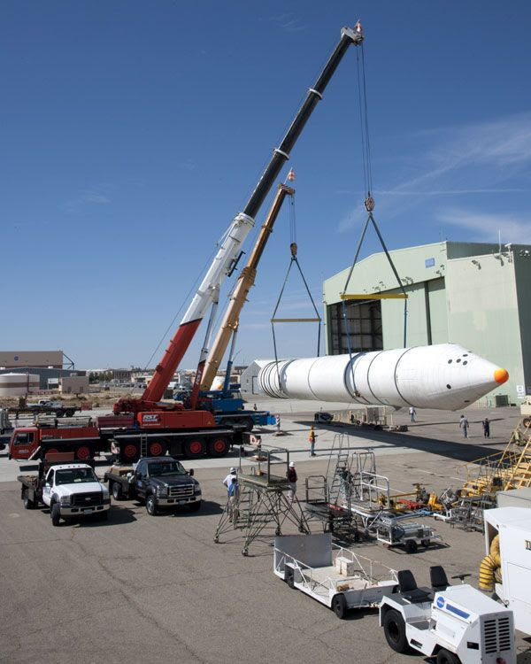 A space shuttle SRB is prepped for temporary storage at Edwards AFB in California, on August 29, 2012.