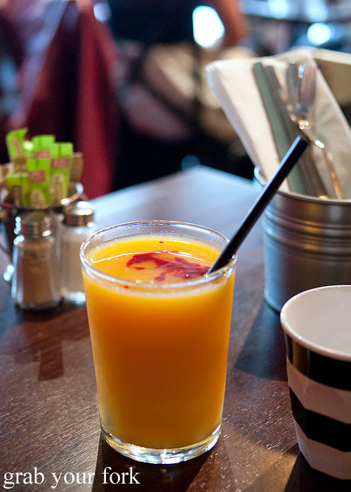fresh orange juice with raspberry coulis at the hub house diner dulwich hill
