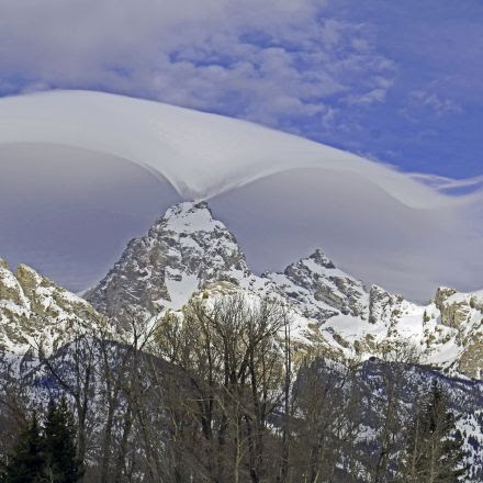 Mysterious, Wavelike Cloud Hugs Grand Teton Mountains