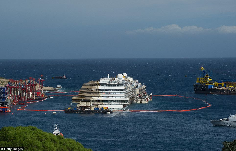 Damage: The vessel is covered in rust and stained by the sea, while all the windows which were submerged in Giglio harbour, Italy, have been shattered
