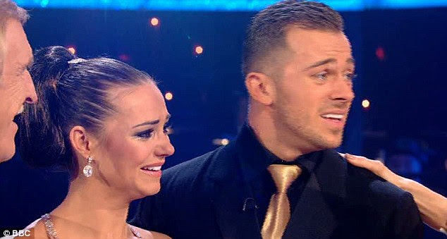  Thrilled: Both Kara and Artem struggled to contain their emotions as they accepted the trophy