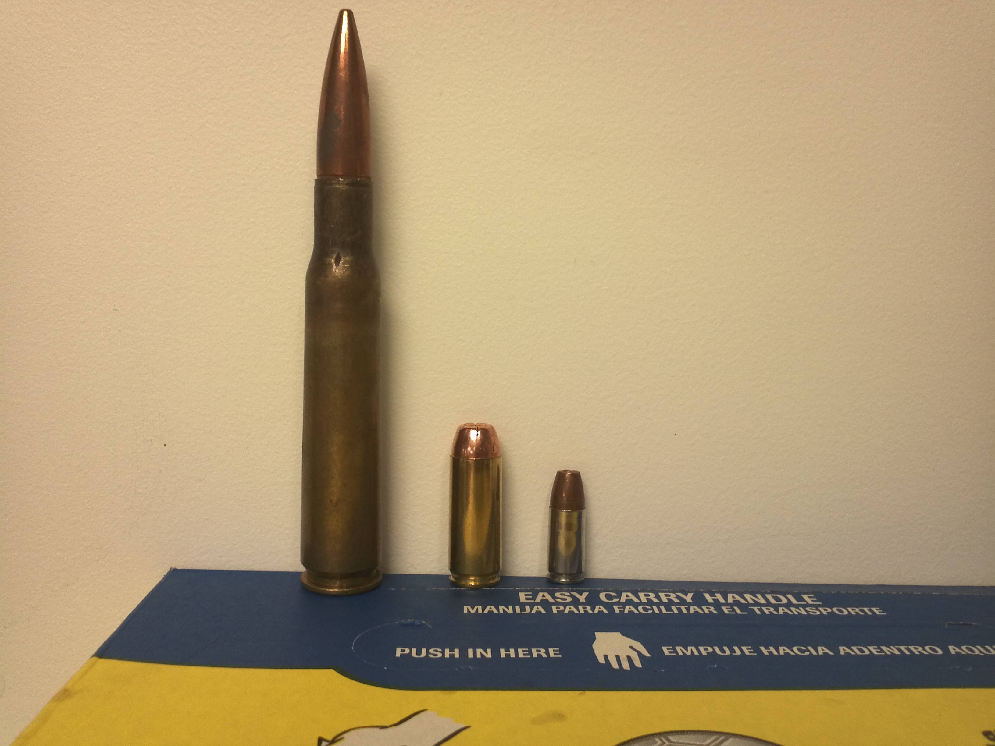 50ae Vs 50bmg Vs 9mm Guns