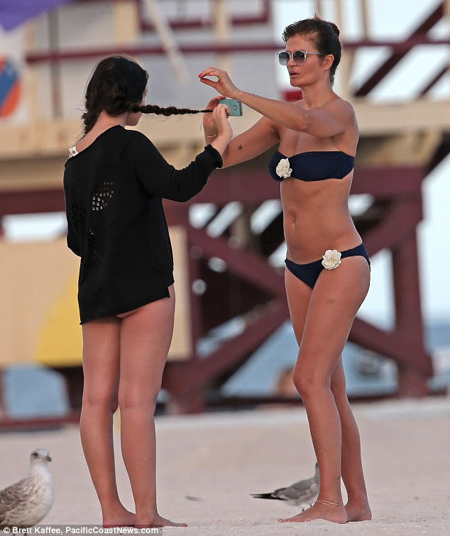 Helena Christensen navy bikini Miami 