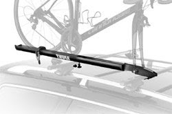 The Thule Peloton Fork Mount Rooftop Bicycle Carrier mounted on a car rack