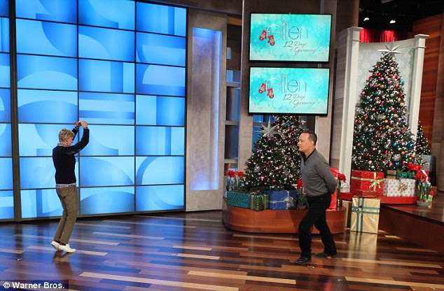 Zooming around the rink: Tom and Ellen began to mime the opening of Merry Christmas Charlie Brown, which features the characters ice skating 