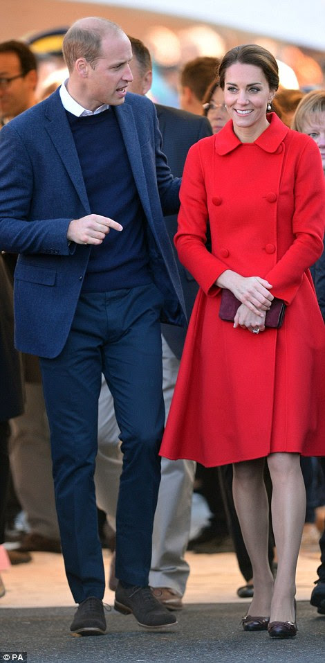 William rested a hand on Kate's back as the couple took a walkabout through the streets of Whitehorse on Wednesday