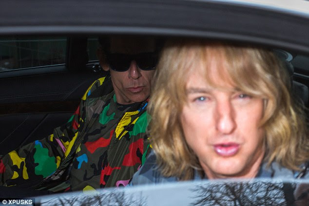 Stiller's camouflage jacket was anything but invisible in the back seat