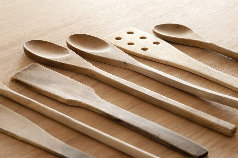 Set of old plain wooden cooking utensils - Free Stock Image