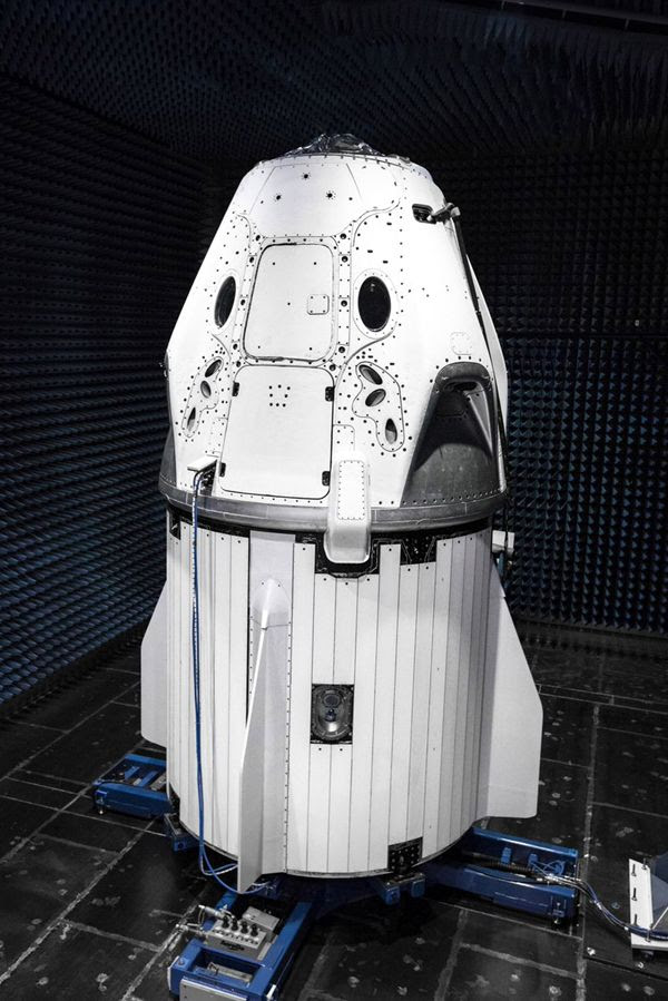 SpaceX's Crew Dragon capsule undergoes electromagnetic interference testing inside an echo-free chamber.