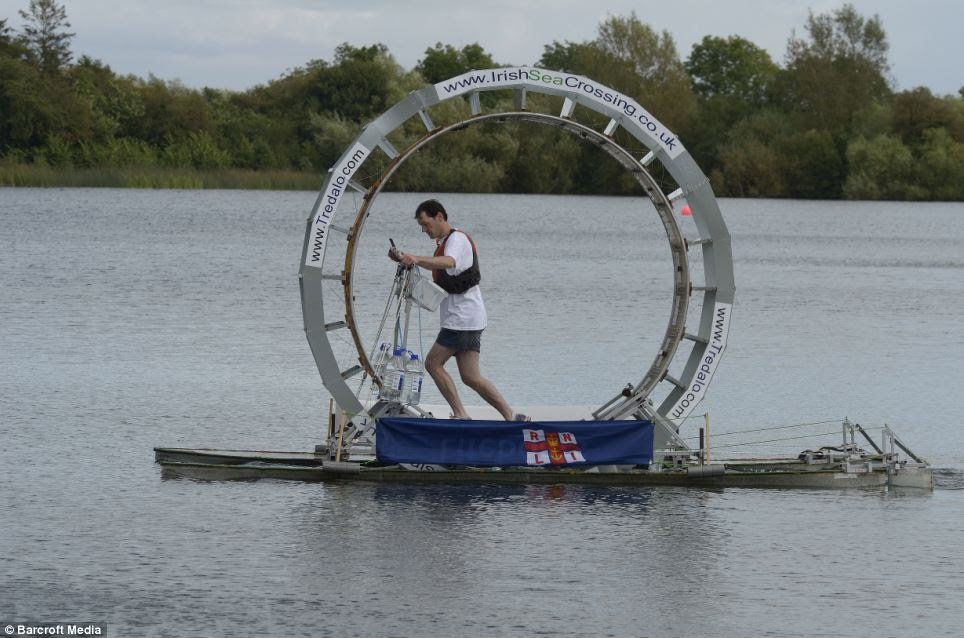 Strapped in: Chris Todd walks on water with the help of his self built 