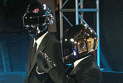 Thomas and GuyManuel de Homem wearing their signature robot style helmets in public