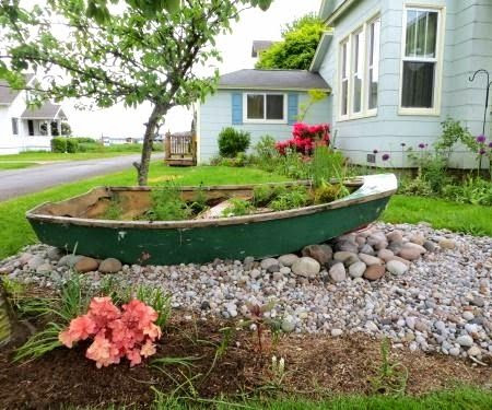 with Boat Planter. http://www.completely-coastal.com/2014/06/outdoor ...