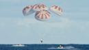 NASA astronauts go back to the future with capsule launch