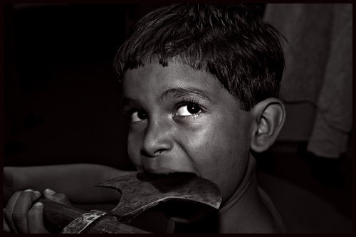 Sharukh Rafaee - Cutting Tongue With An Axe by firoze shakir photographerno1