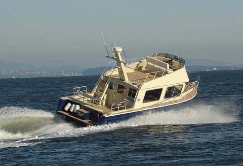  shows lifting forces on hull by evidence of the hollow behind the boat