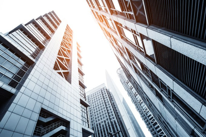 Up looking Skyscrapers and sky.