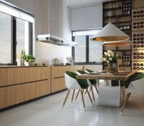 This natural wood wine storage wall is the highlight of the dining room. The same material is used with the cabinets in the kitchen to bring it all together. Spotlights make it front-and-center.