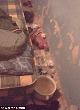 The dirty potty which was filled with urine and kept next to the mattress 