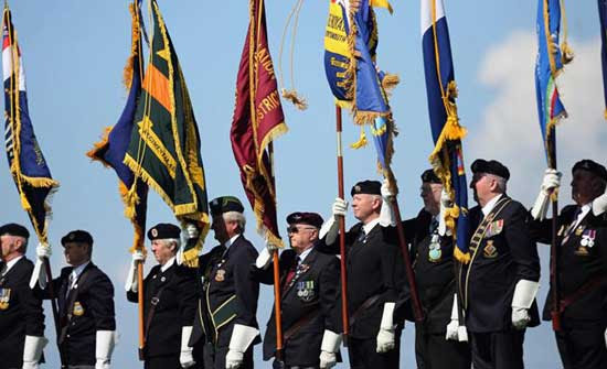WWII veterons attend a Drumhead Service on Southsea Common in commemoration of the D-Day landings on June 5, 2014 in Portsmouth, England. 