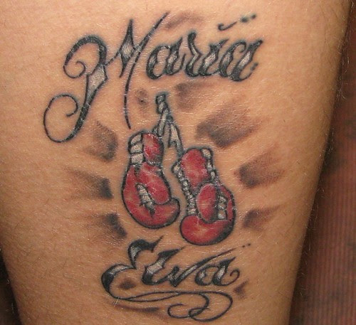 Some of the boxing tattoos you might consider could be of your favorite 
