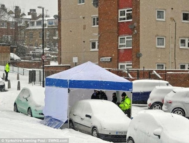 On Thursday, a 75-year-old woman's body was found lying underneath this car in the Farlsey area of Leeds. A blue police tent was erected over her body