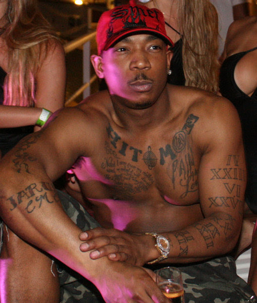 The rapper also has a large back piece tattoo which contains two angel wings 