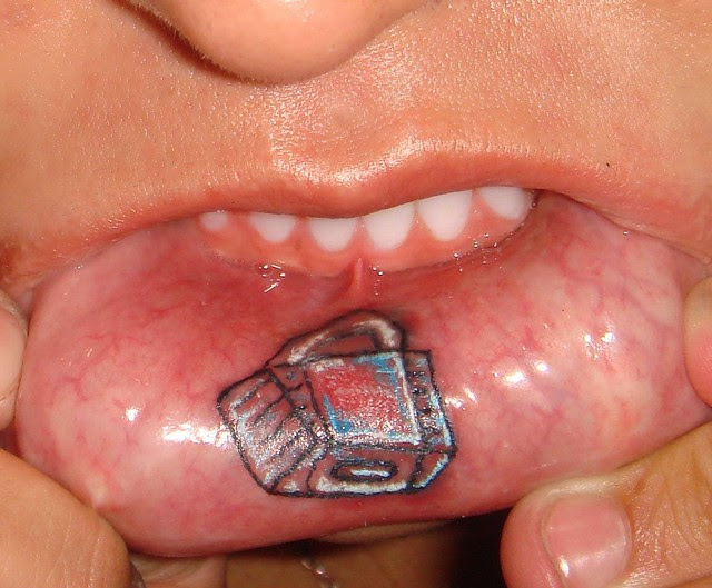 Scars from old snake bite piercings; Scars from old snake bite piercings 