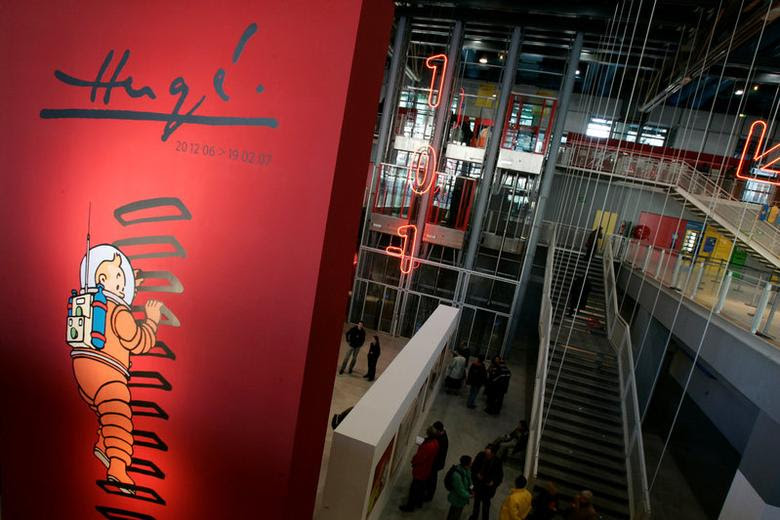 A giant poster of Tintin is seen inside the Centre Pompidou modern art museum in Paris December 19, 2006. REUTERS/Benoit Tessier/File Photo