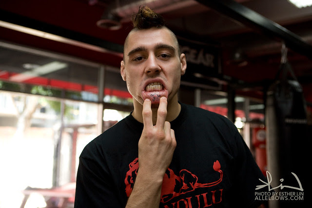 He has a skull and crossbones tattooed on the inside of his lip.