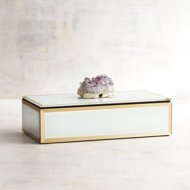 A geode jewelry box that'll be a spacious place to store hair ties, bobby pins, loose change, and the one actually valuable necklace your grandmother gave you when you turned 18.
