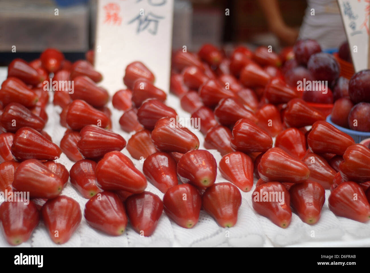 chinese market fruit stall - rose apple stock photo, royalty free