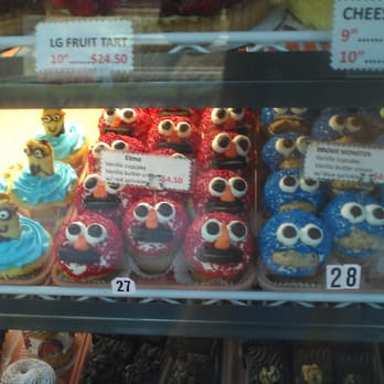 minions (Despicable Me), elmo, and cookie monster cupcakes ~phone pic