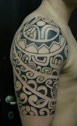 http://davidavery.files.wordpress.com/2009/04/tribal_tattoo_black_depth.jpg