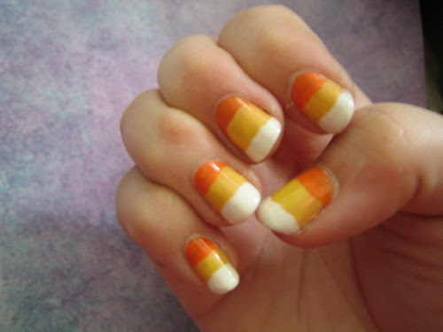 Candy corn yellow nail art design 