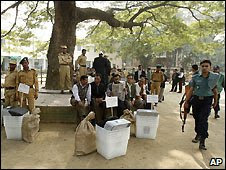 Security personnel guard polling boxes in Dhaka, Bangladesh - 28/12/2008